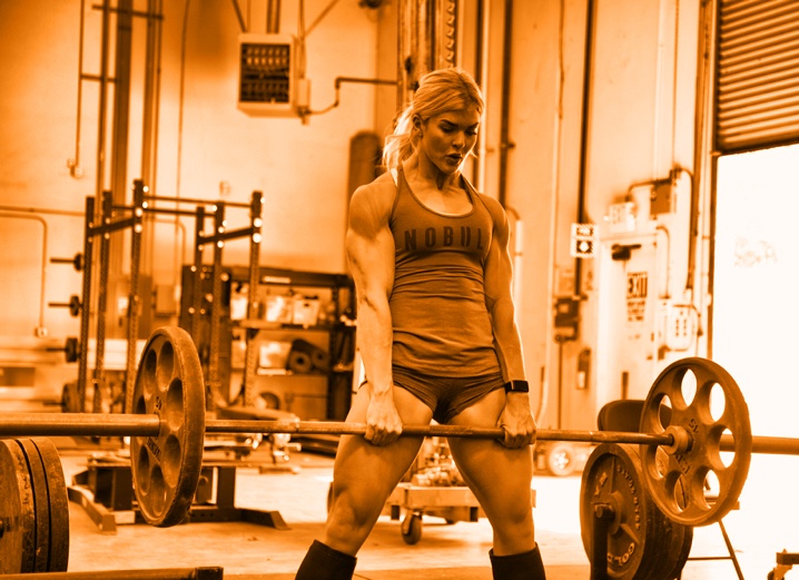 Image of Brooke Ence lifting a heavy barbell