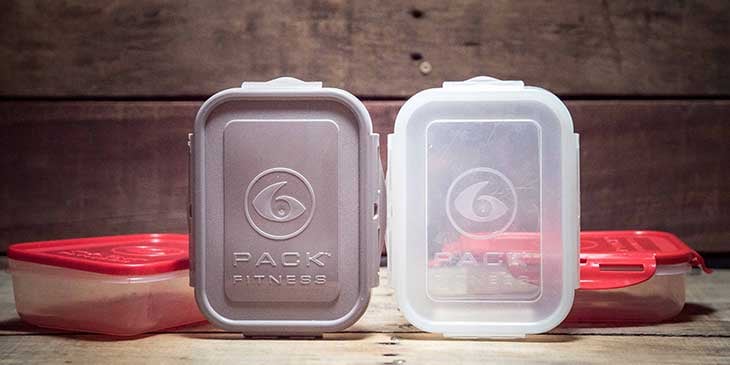 6-pack fitness meal prep containers placed on a wood background