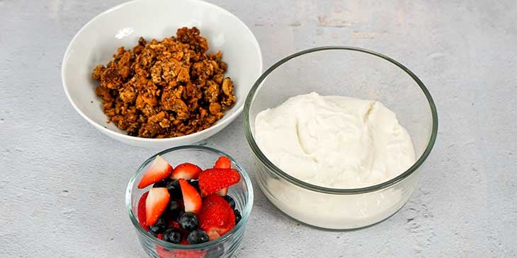Ingredients in separate bowls for Paleo Coconut Yogurt Parfait