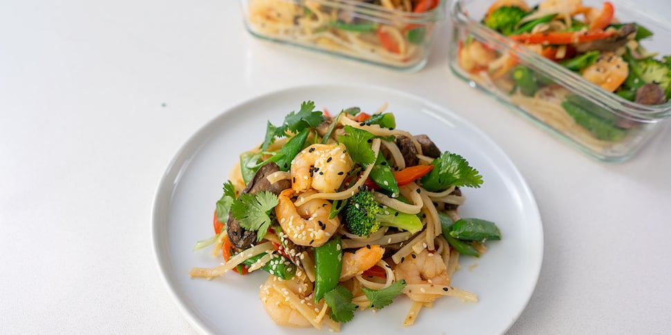 shrimp noodle stir fry on plate for meal prep 