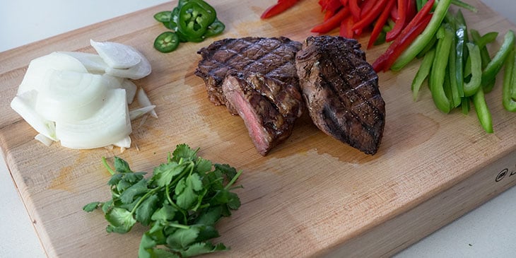 steak fajita bowl recipe ingredients on cutting board 