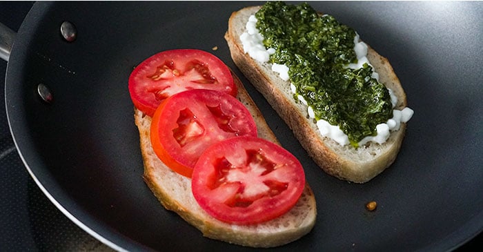 toasting-chicken-pesto-sandwich-ingredients-in-skillet