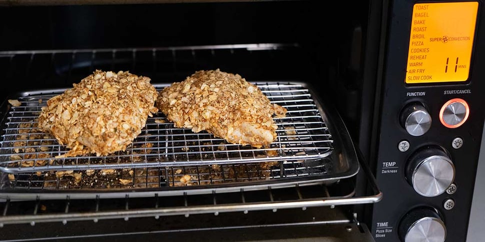air frying keto fried chicken on a countertop oven