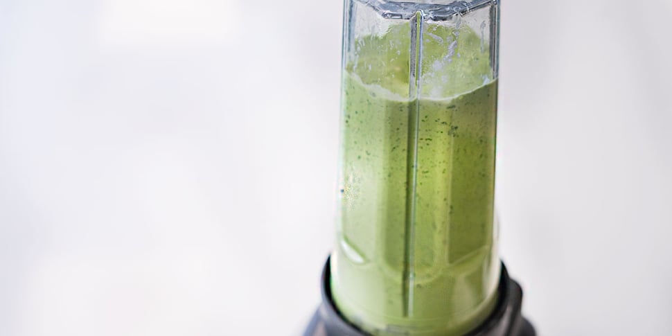 blending keto green smoothie in blender for meal prep 