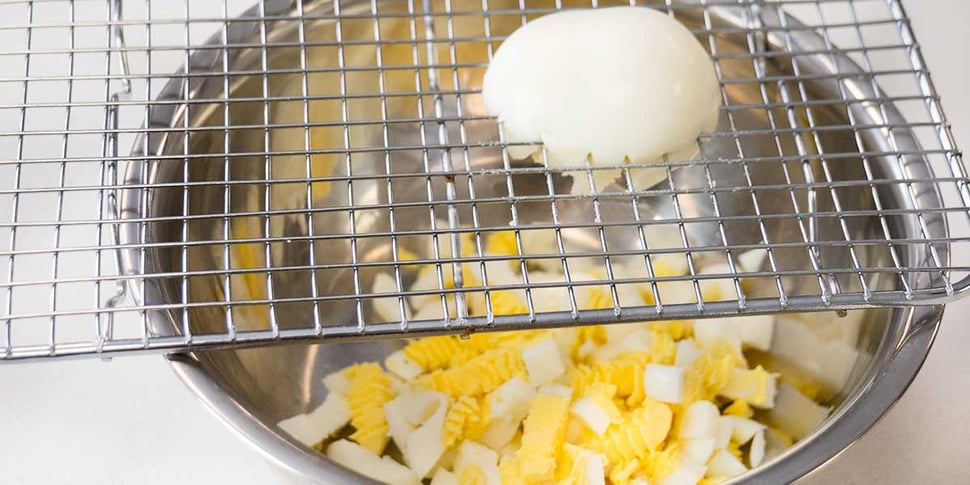 dicing hard boiled eggs for keto avocado egg salad recipe