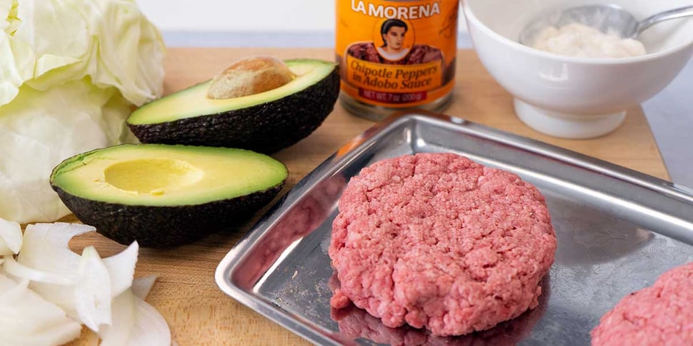 ingredients for keto burger on top of a cutting board