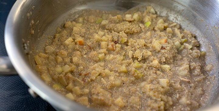 quinoa breakfast bowl cooking in pot 