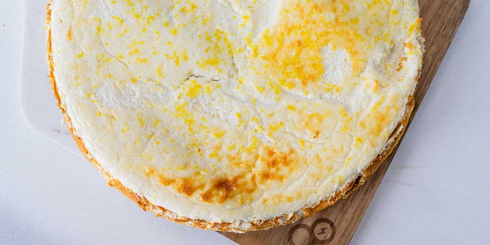 lemon ginger protein cheesecake recipe on cutting board