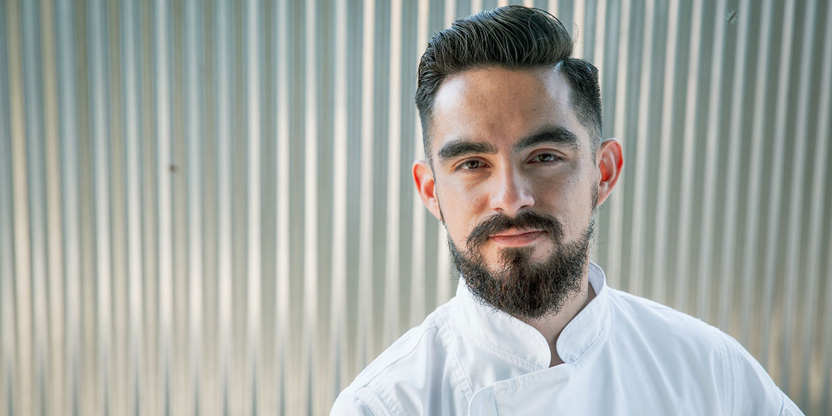 Chef Mario Limaduran wearing chef whites headshot