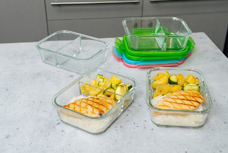 Chicken, rice, and zucchini in meal prep containers